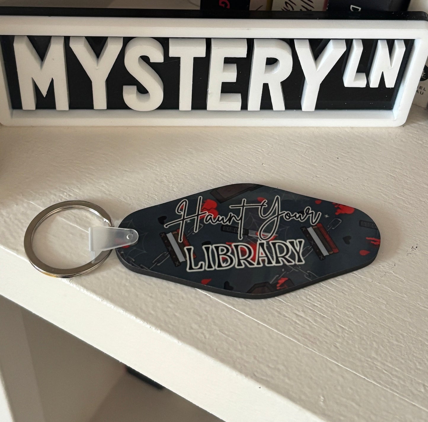 Motel Keytag Bookish Keychain - Haunt Your Library (EveryLibrary Charity Item)